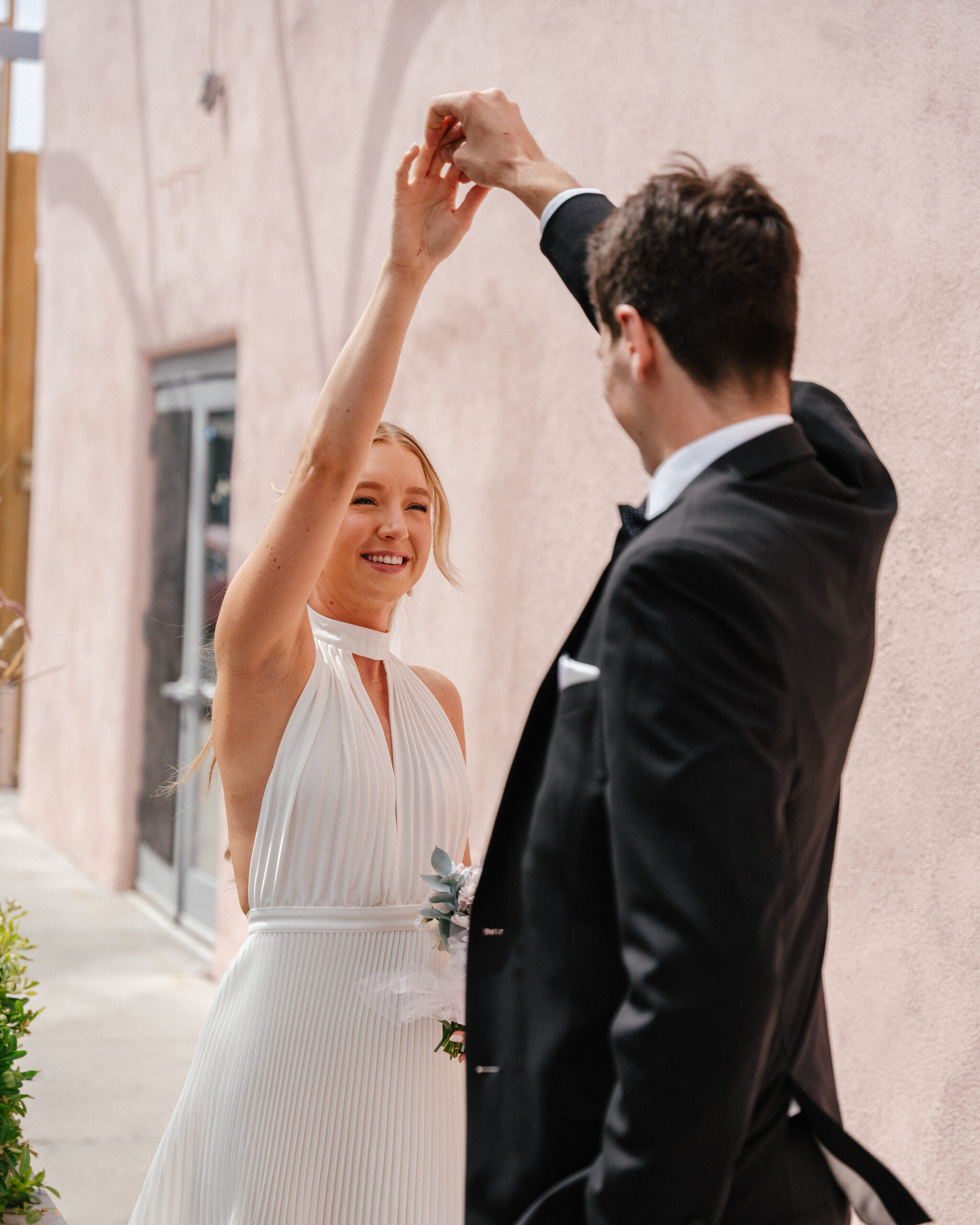 couple dances just after their wedding at a little white chapel in las vegas, nv