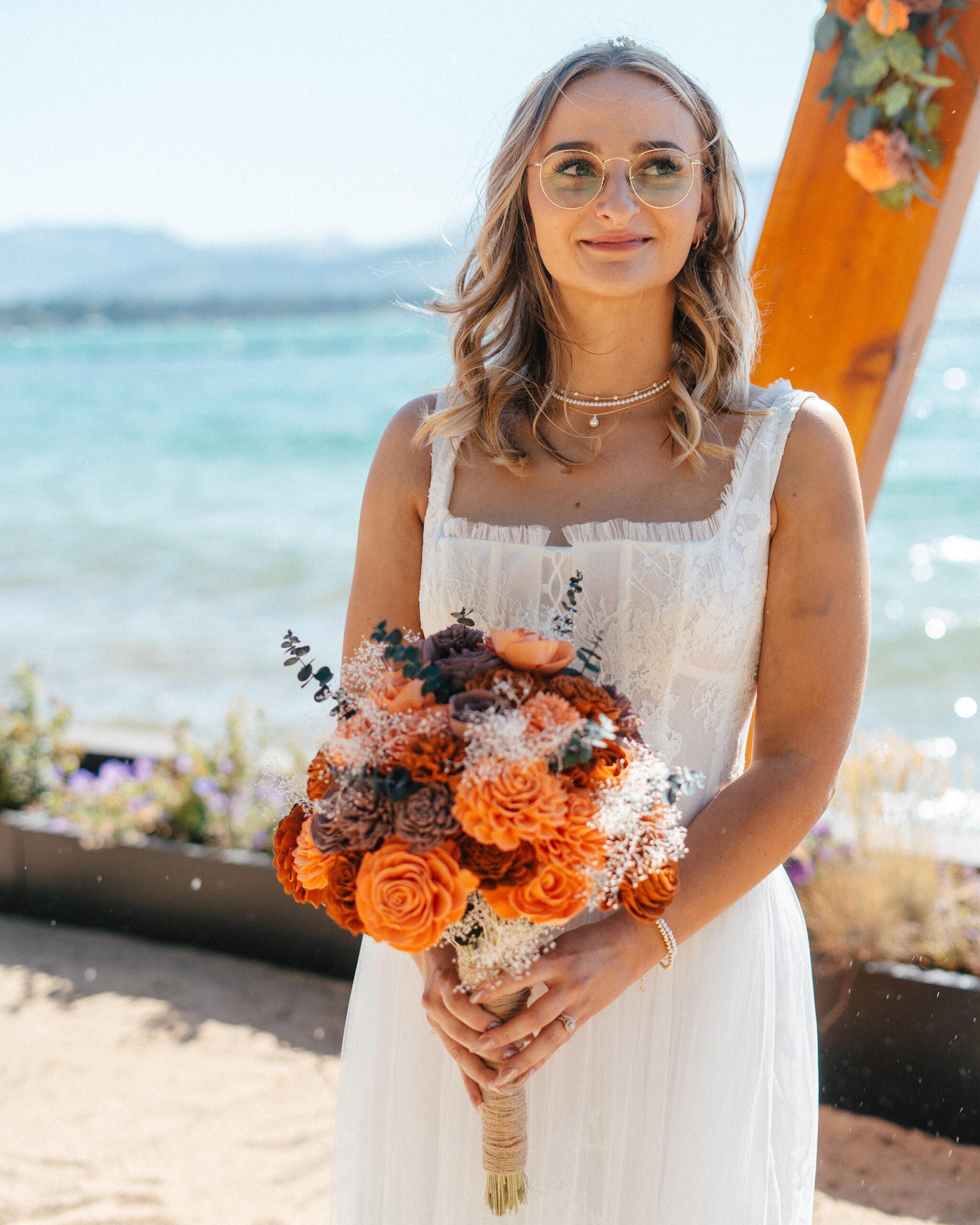 Golden light catches the bride’s smile during her South Lake Tahoe elopement.