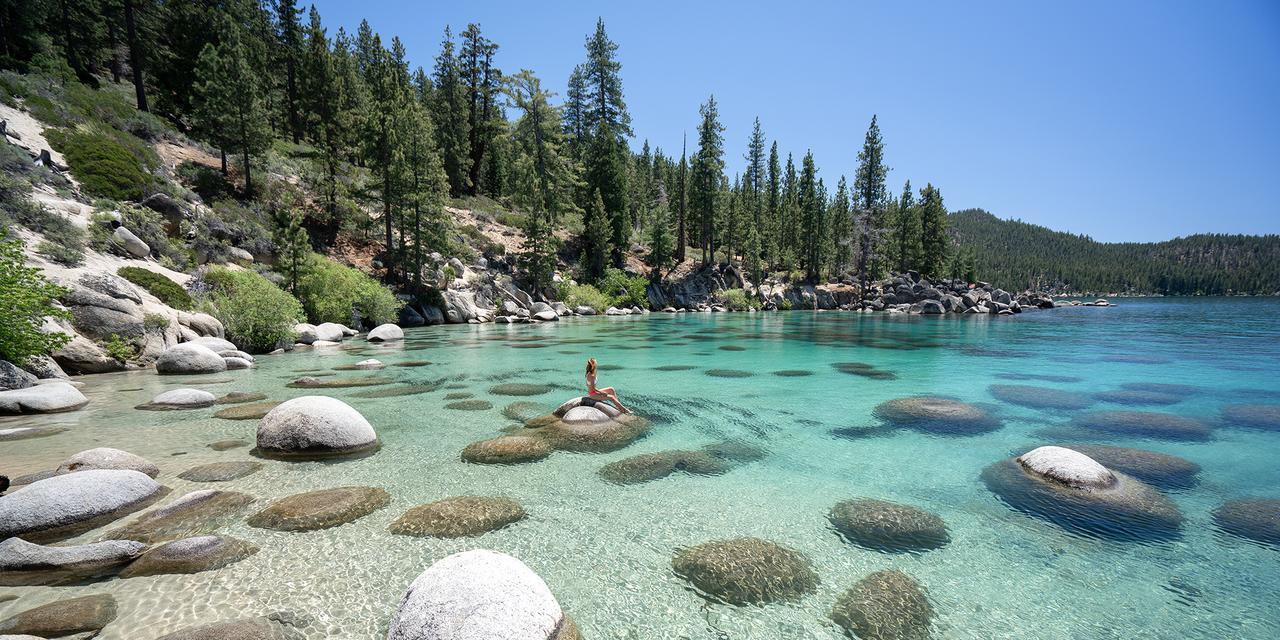 beautiful view of the crystal clear waters of lake tahoe on a bright and sunny day